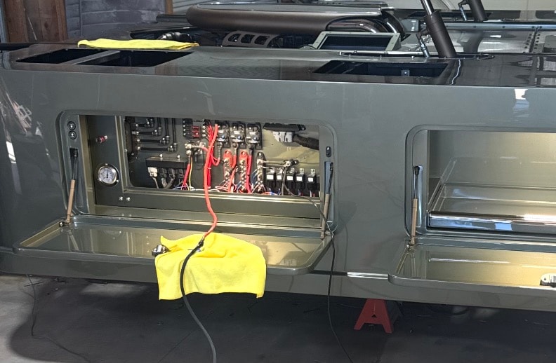 Custom truck electrical system and mechanical components in the workshop